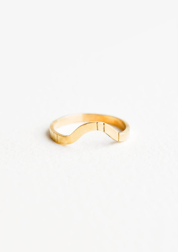 1: Yellow gold ring with medium size band, arced front, and etched decorative lines.