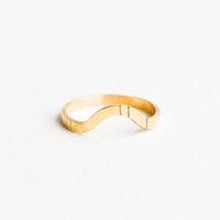 1: Yellow gold ring with medium size band, arced front, and etched decorative lines.