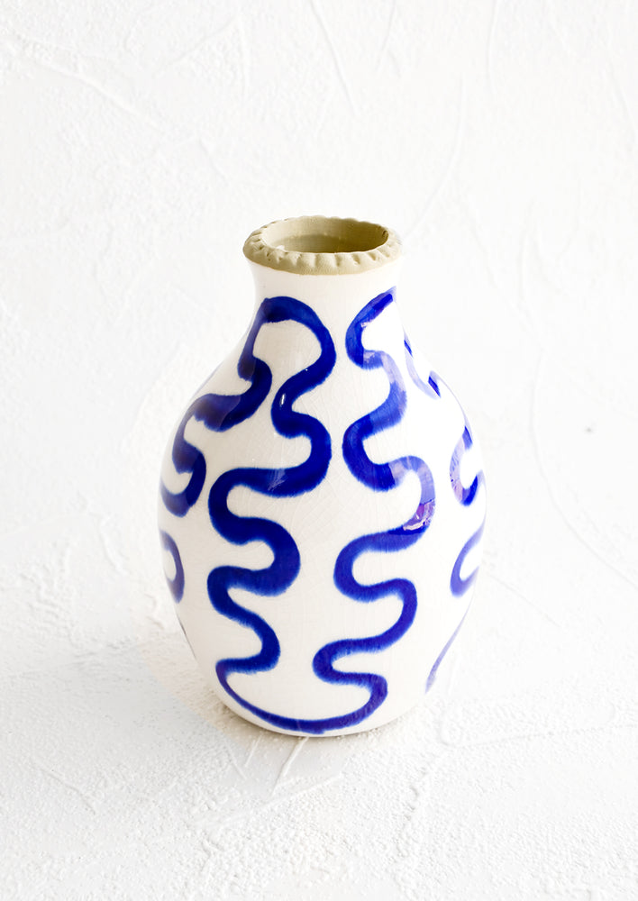 Tall bud vase in glossy white ceramic with cobalt blue squiggle print