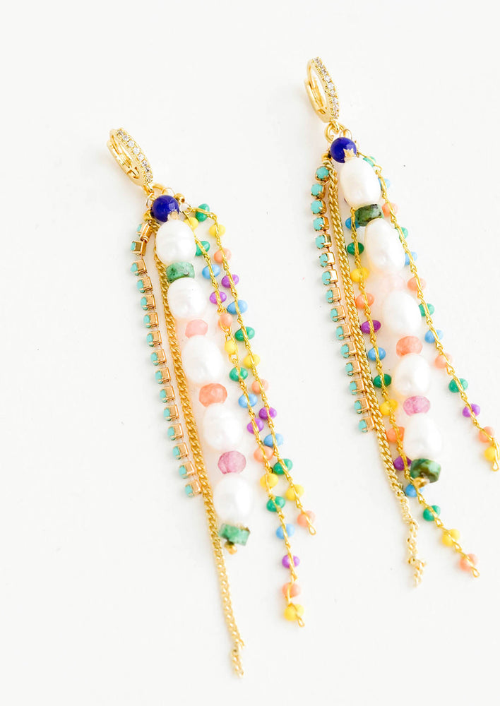 Dangy earrings with multiple gold chain and colorful beaded strands, main center strand in pearl beads