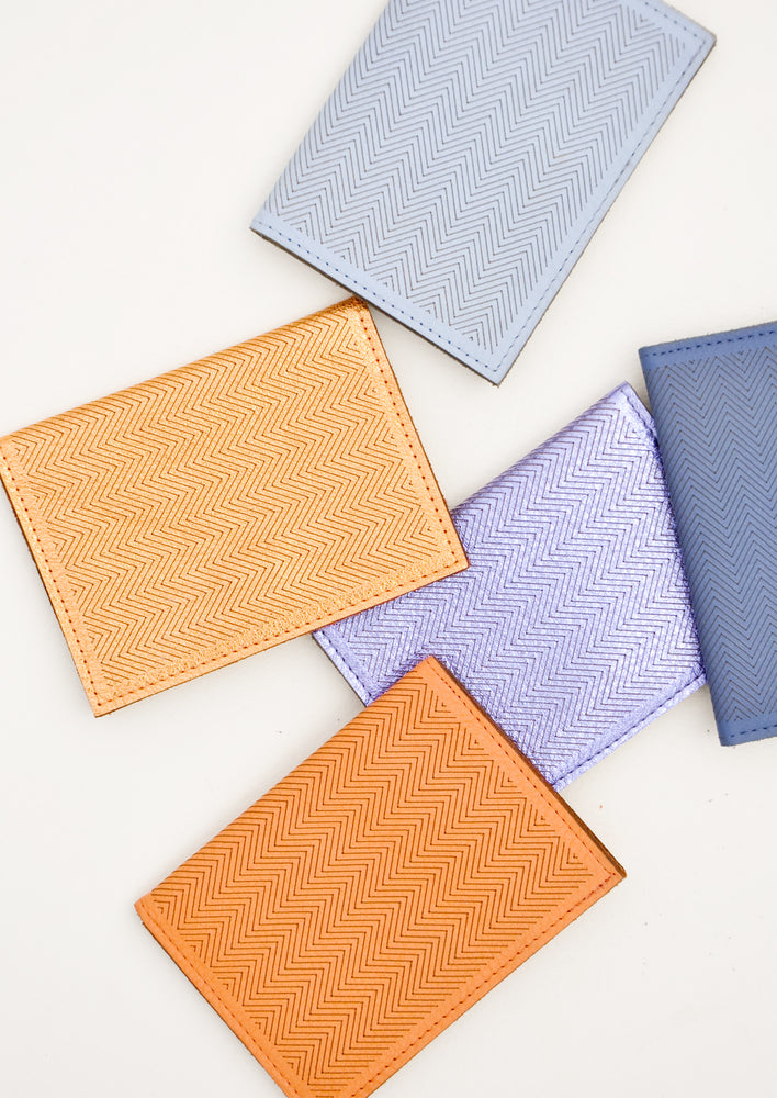 Product shot showing multiple colors of wallet.