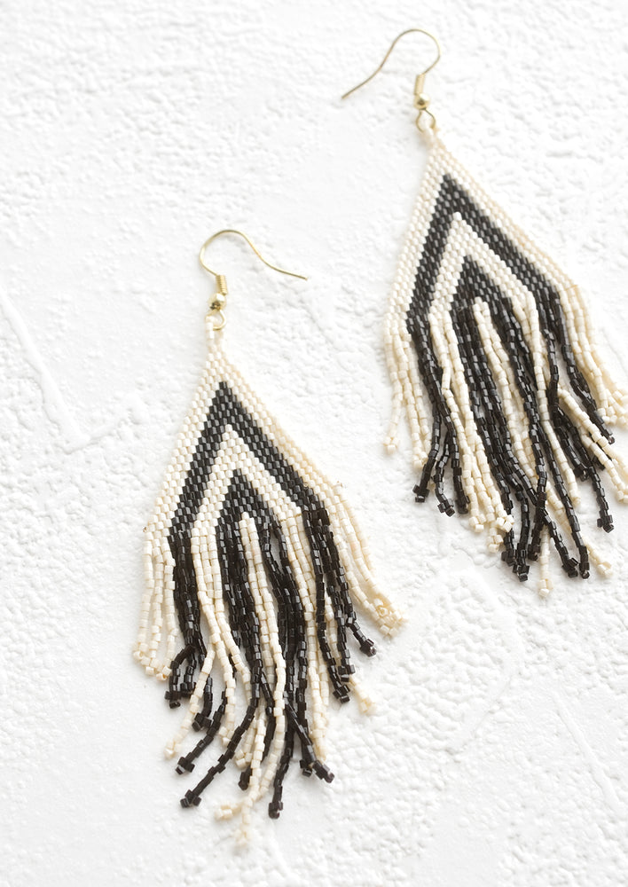 1: Triangular earrings made from black & white seed beads with fringed bottom